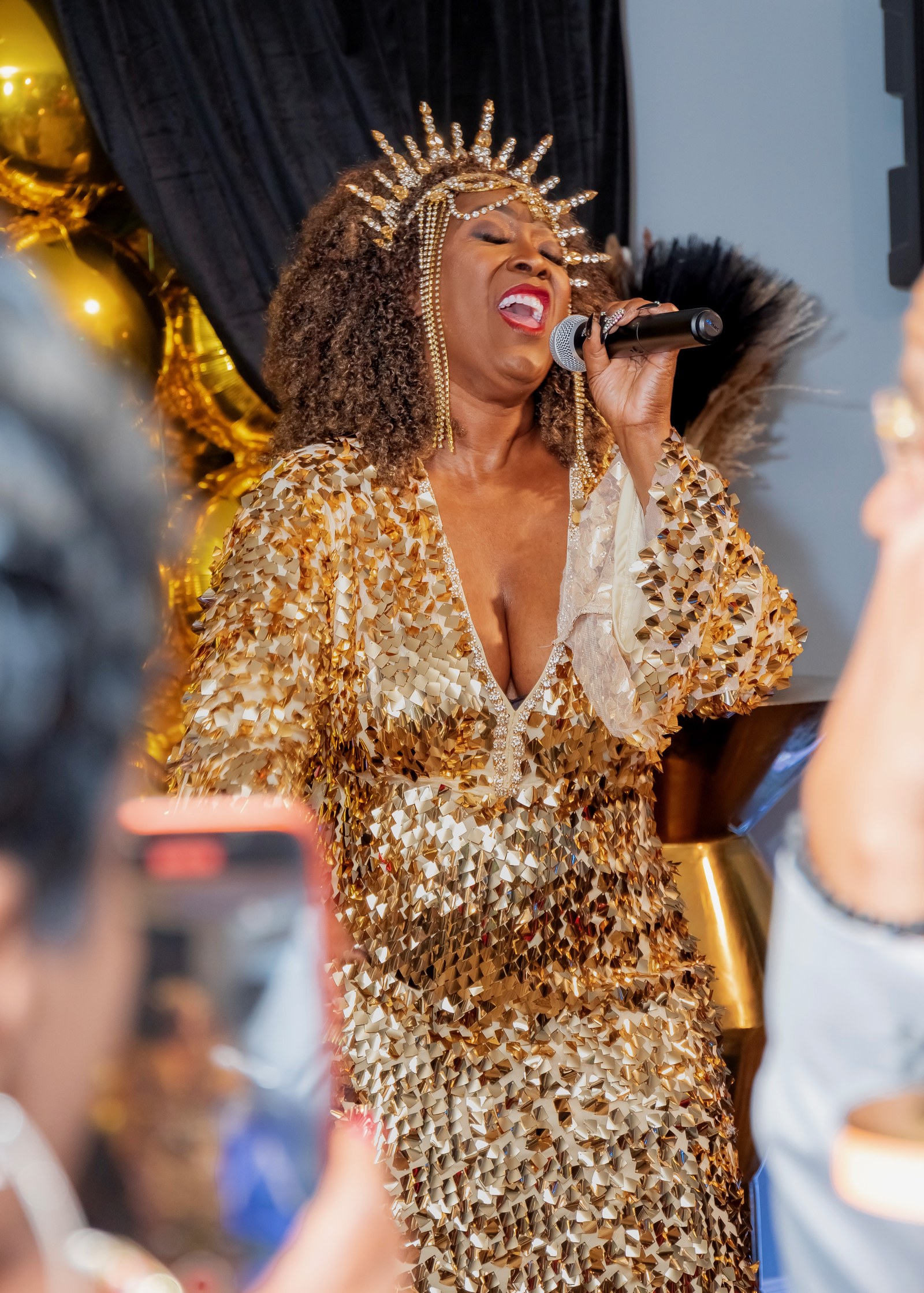 Tornesia performing in gold